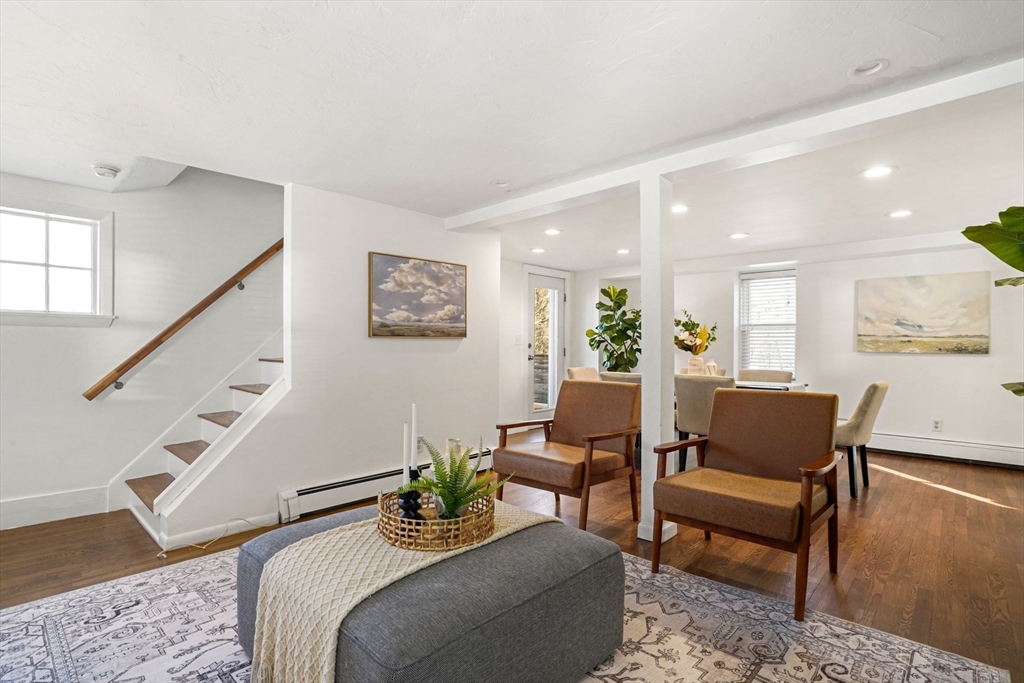 12 Sassamon Street Canton, MA 02021 - Photo 11 of 38 a living room with furniture and wooden floor