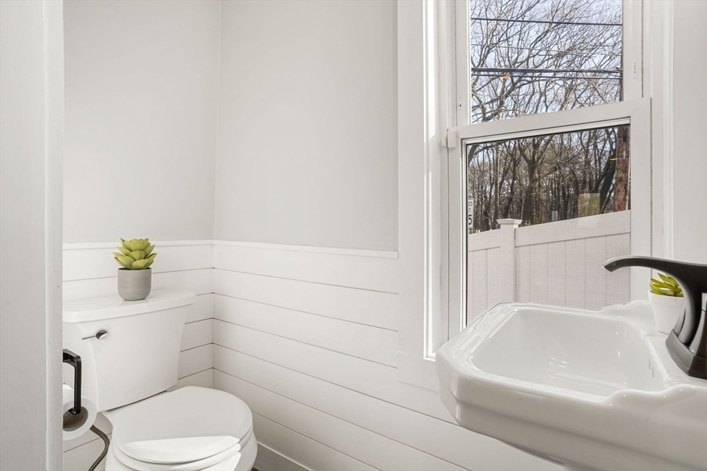 12 Sassamon Street Canton, MA 02021 - Photo 15 of 38 a bathroom with a toilet and a sink