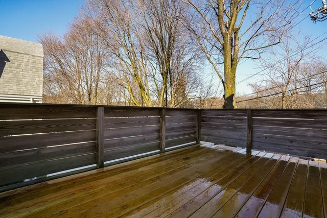 a view of wooden fence and trees