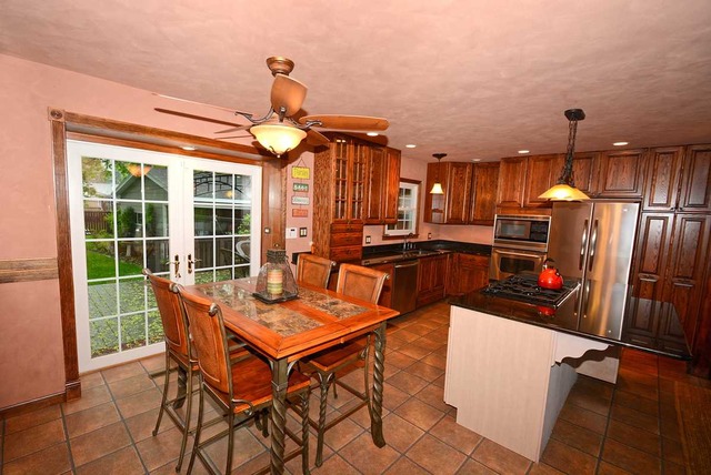 318 Village Road Willowbrook, IL 60527 - Photo 11 of 23 a view of a chairs and table in a patio