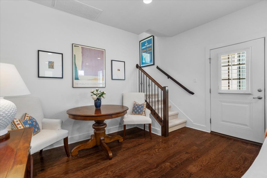12200 Tawny Farms Road, Unit 139 Austin, TX 78748 - Photo 11 of 30 Right by the front door, you have this wonderful, versatile nook. It’s the perfect spot for a greeting station, a small console table, or even a couple of accent chairs like you see here.