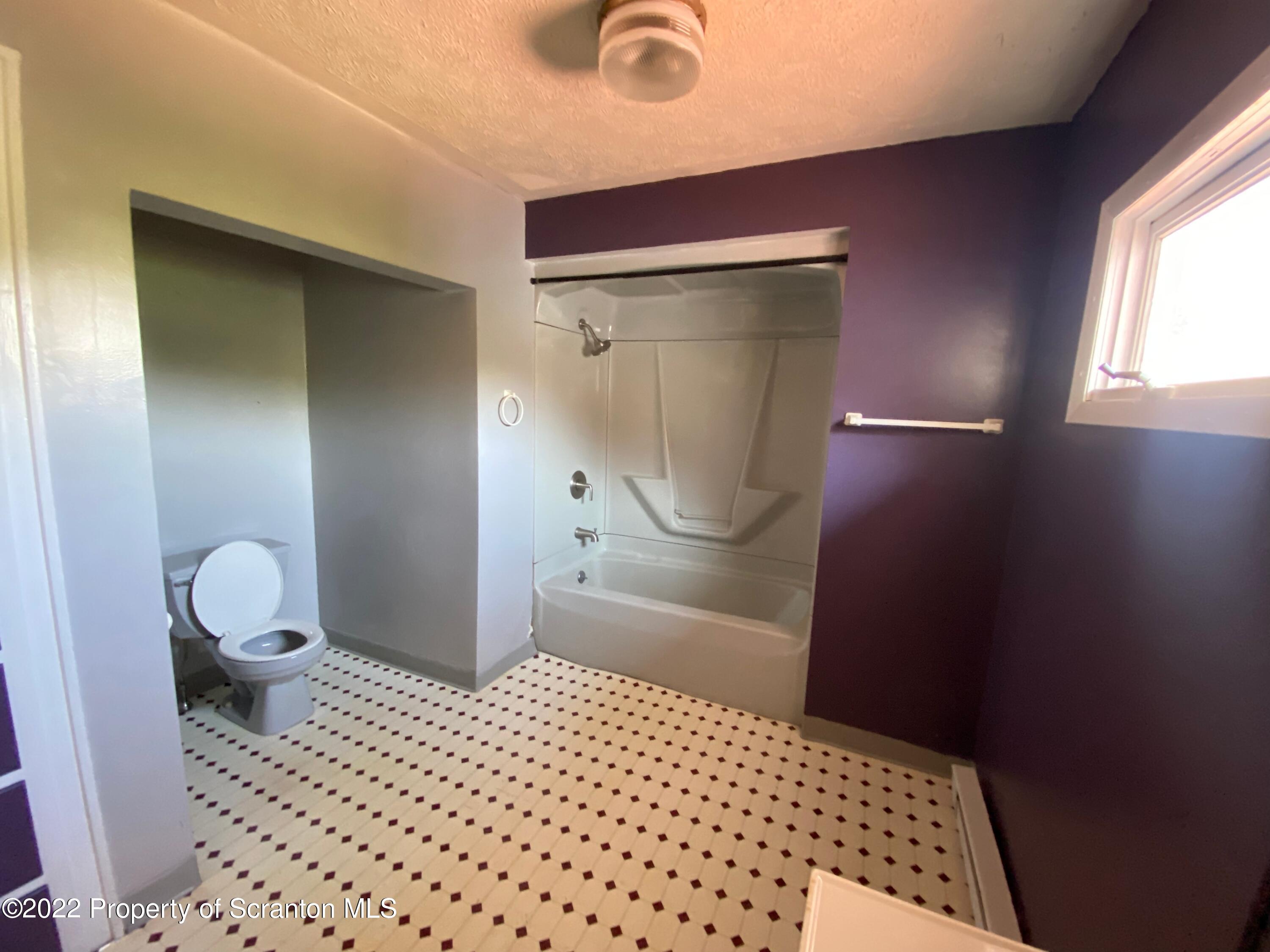 600 Main Street Moosic, PA 18507 - Photo 12 of 19 a bathroom with a sink and a toilet