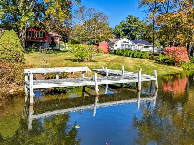 a view of a swimming pool with seating area