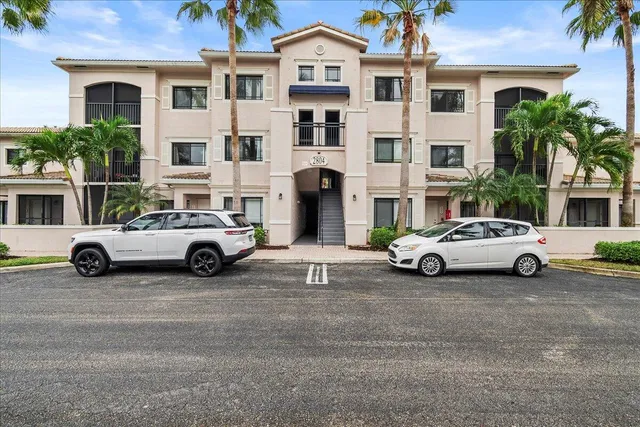 a view of a double door is parked in front of a building