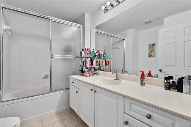 a bathroom with a shower and toilet