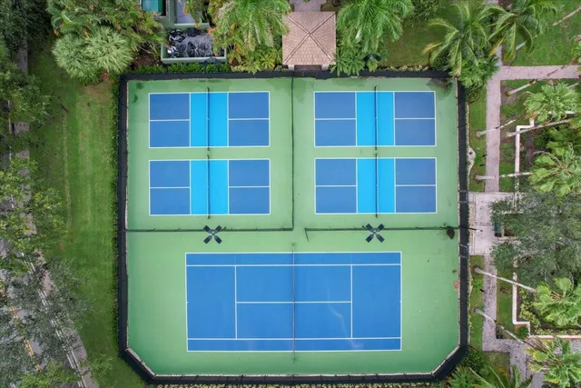 an aerial view of house with yard