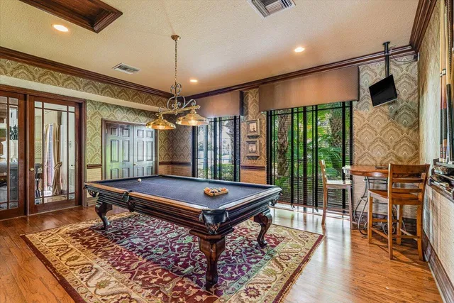a bathroom with a granite countertop sink and vanity