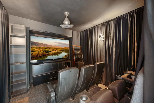 a bathroom with a sink toilet vanity and shower