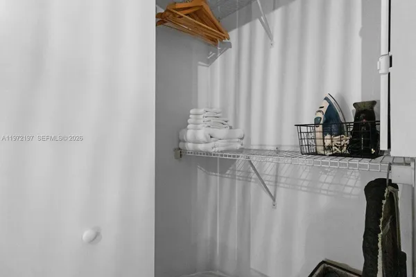 a bathroom with a shower curtain