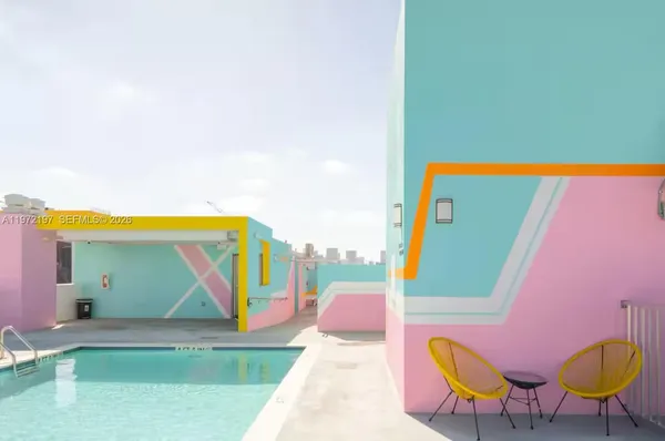 a view of swimming pool with a lounge chair
