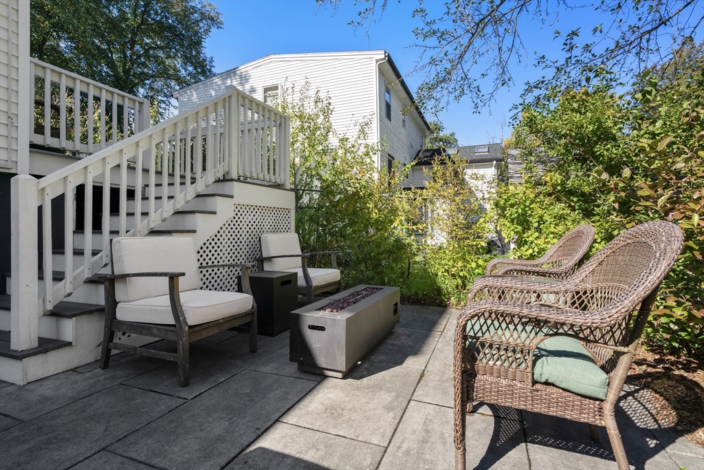1 Dow Road Boston, MA 02132 - Photo 24 of 28 a view of a chairs and table in backyard