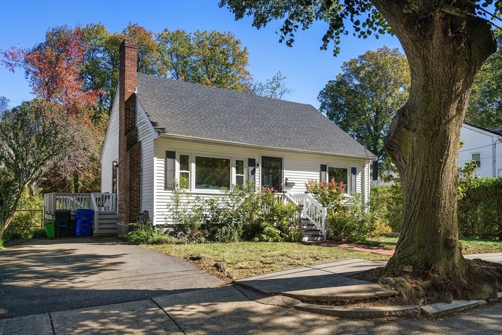 1 Dow Road Boston, MA 02132 - Photo 7 of 28 a front view of a house with garden