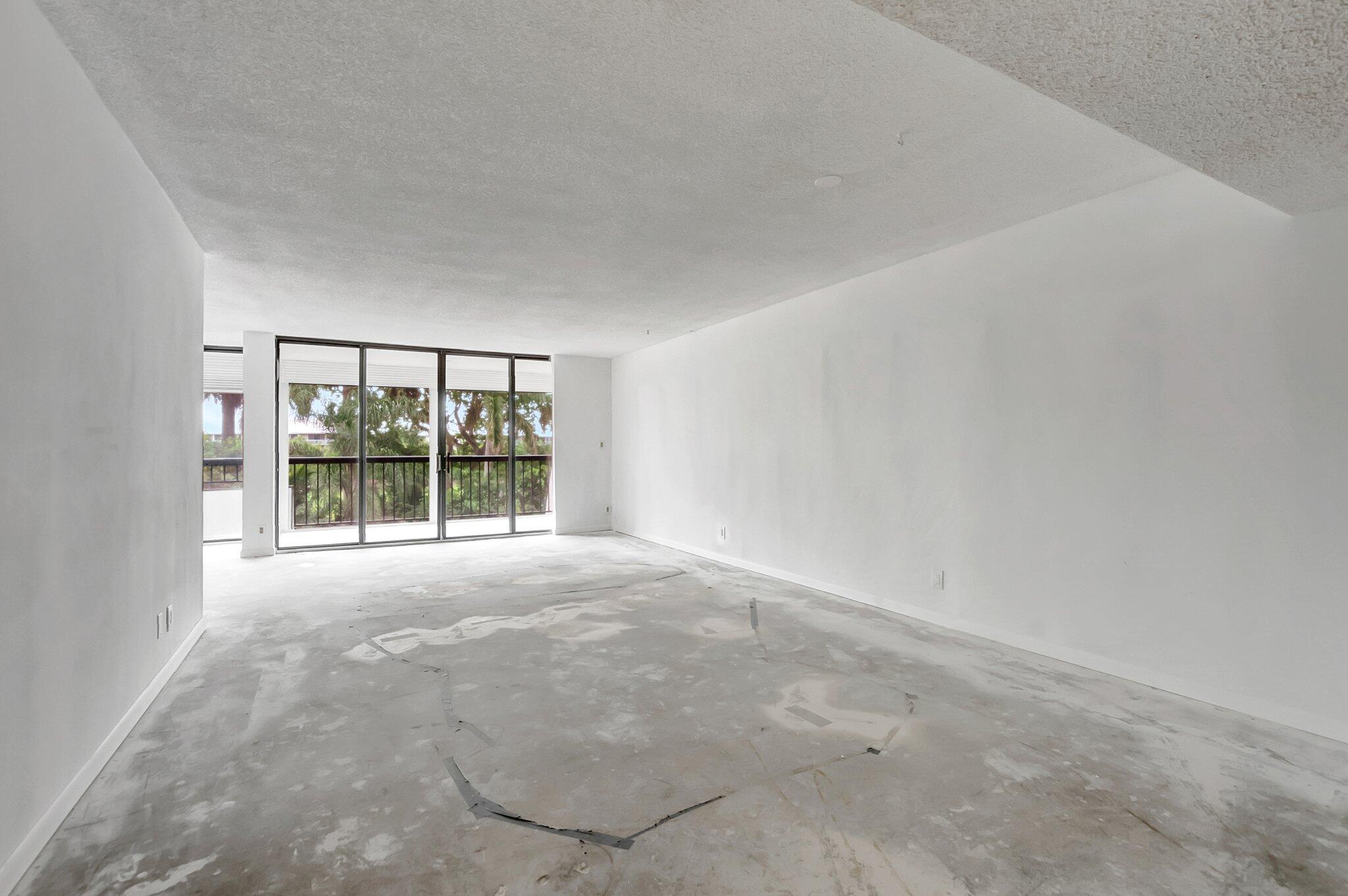 6320 Boca Del Mar Drive, Unit 301 Boca Raton, FL 33433 - Photo 11 of 46 an empty room with an outdoor view