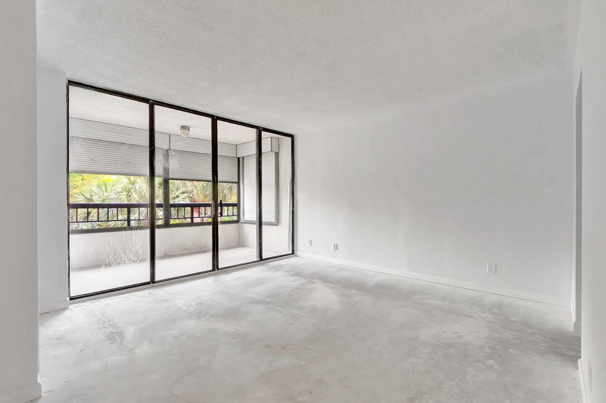 6320 Boca Del Mar Drive, Unit 301 Boca Raton, FL 33433 - Photo 20 of 46 a view of an empty room with a balcony