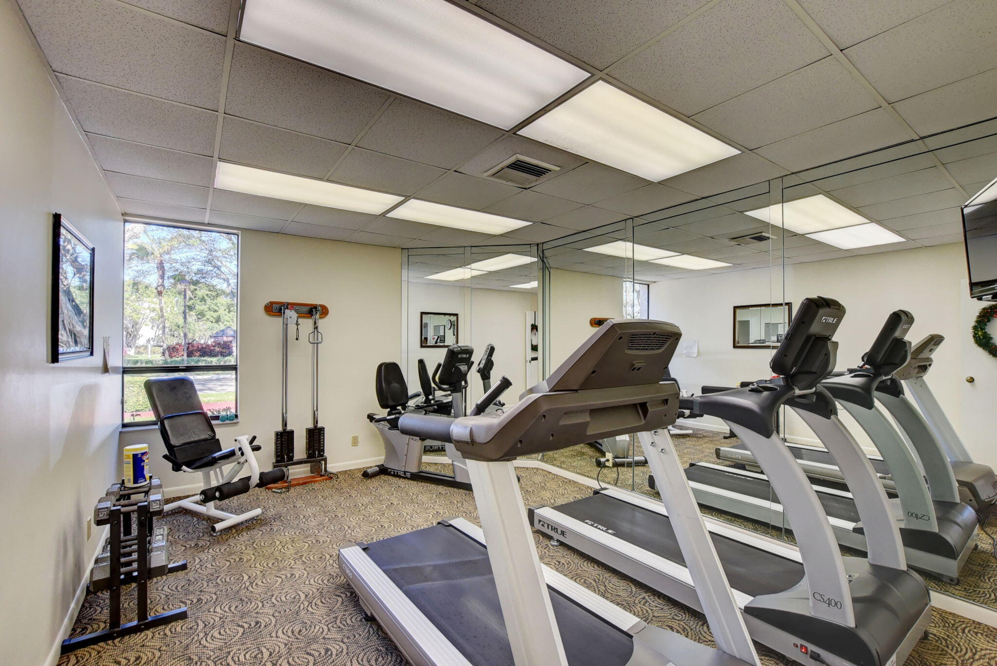 6320 Boca Del Mar Drive, Unit 301 Boca Raton, FL 33433 - Photo 38 of 46 a view of a room with gym equipment