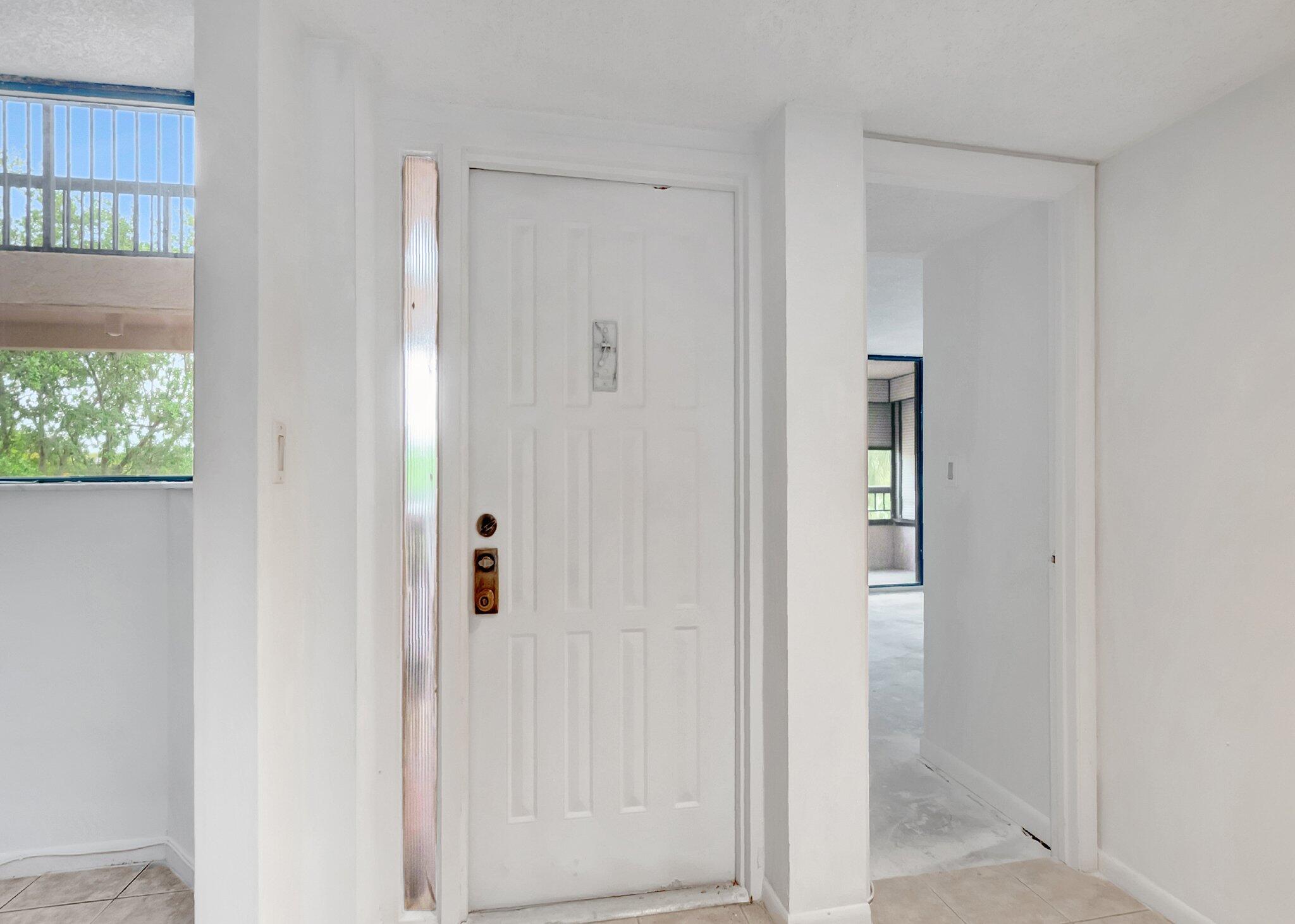 6320 Boca Del Mar Drive, Unit 301 Boca Raton, FL 33433 - Photo 10 of 46 a bathroom with a shower