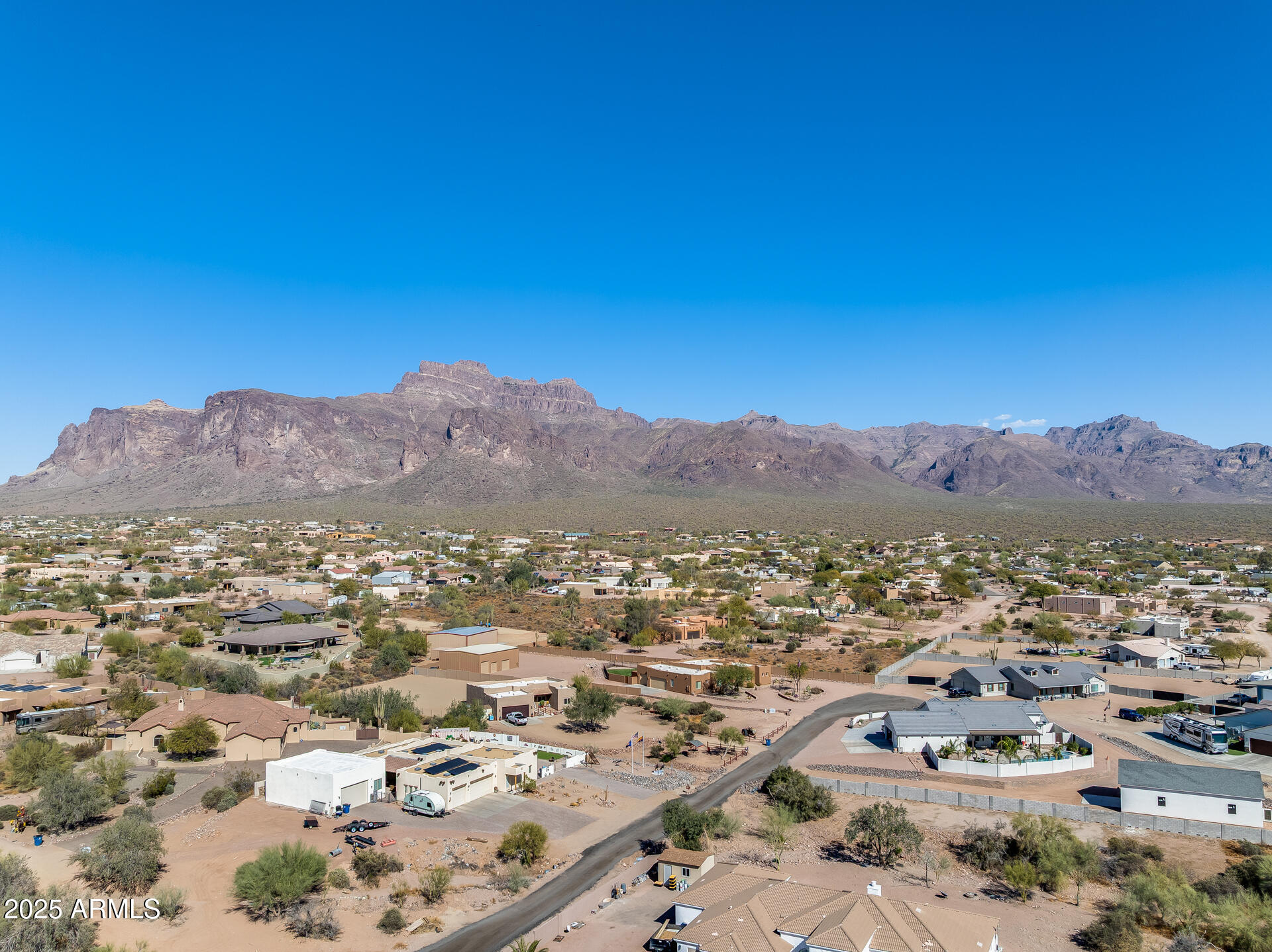 573 South Sun Road, Unit 1 Apache Junction, AZ 85119 - Photo 1 of 21 an aerial view of residential house and green space