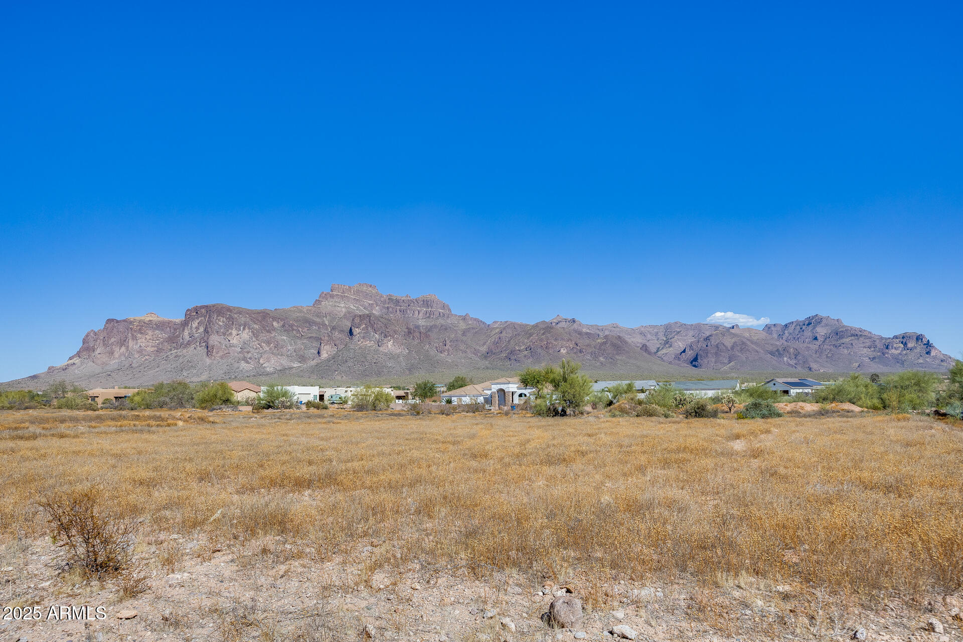 573 South Sun Road, Unit 1 Apache Junction, AZ 85119 - Photo 2 of 21 a view of an ocean with a mountain