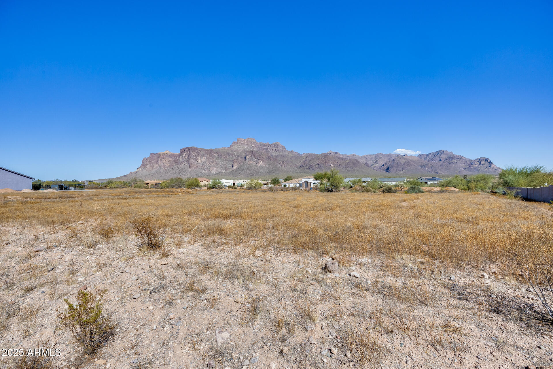 573 South Sun Road, Unit 1 Apache Junction, AZ 85119 - Photo 3 of 21 a view of lake with mountain