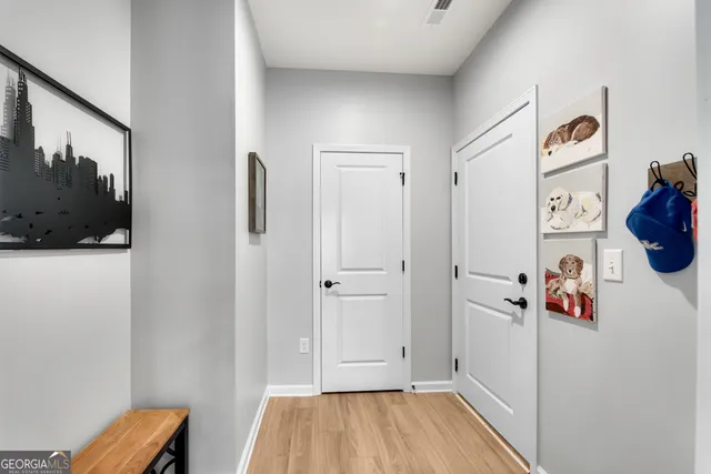 a view of a patio with couches chairs and a big yard
