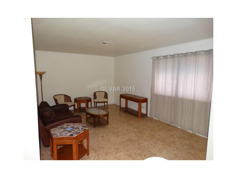 5725 Smoke Ranch Road, Unit C Las Vegas, NV 89108 - Photo 8 of 11 Living Room.