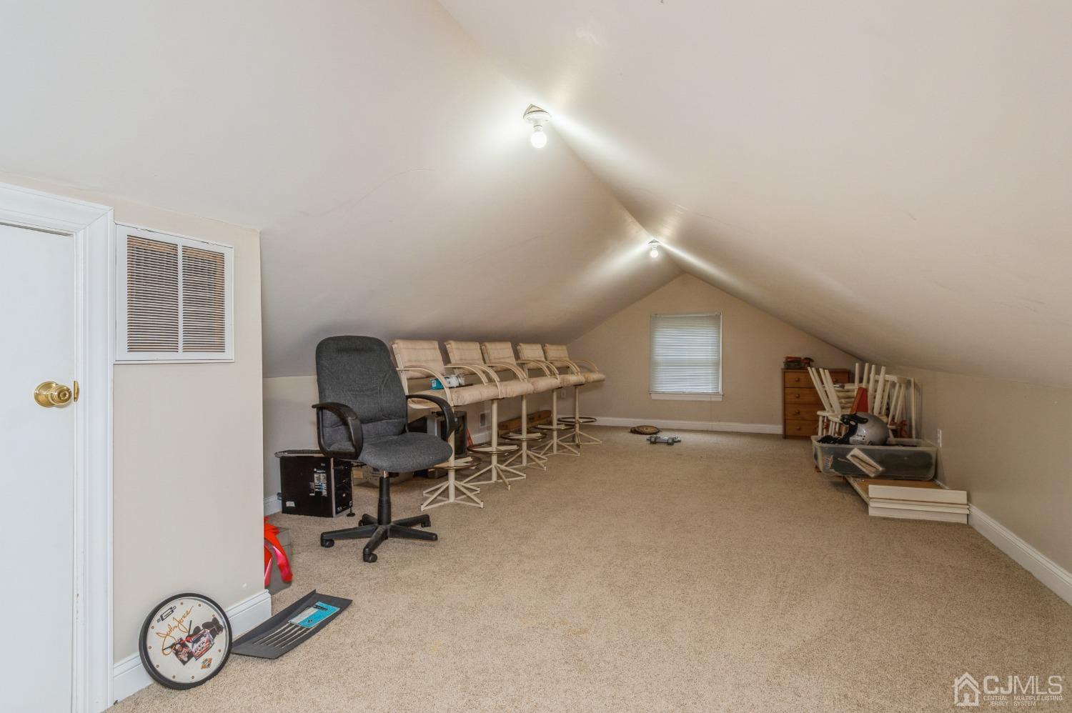 44 Chambers Road Cream Ridge, NJ 08514 - Photo 15 of 27 a view of a workspace with furniture and a window