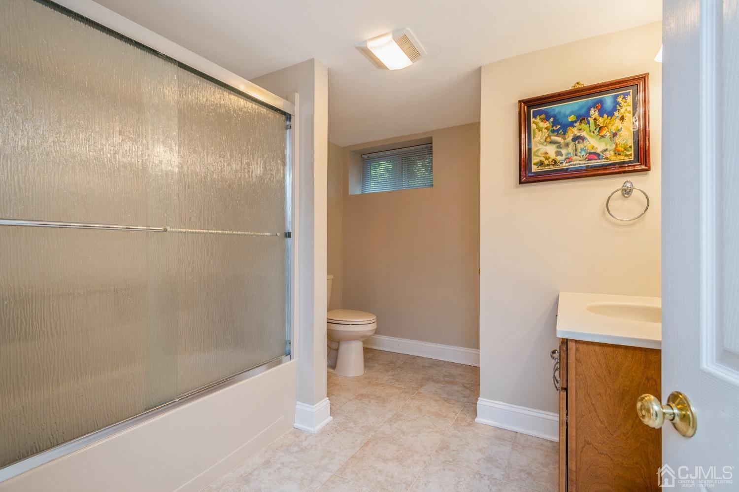 44 Chambers Road Cream Ridge, NJ 08514 - Photo 18 of 27 a bathroom with a shower and a toilet