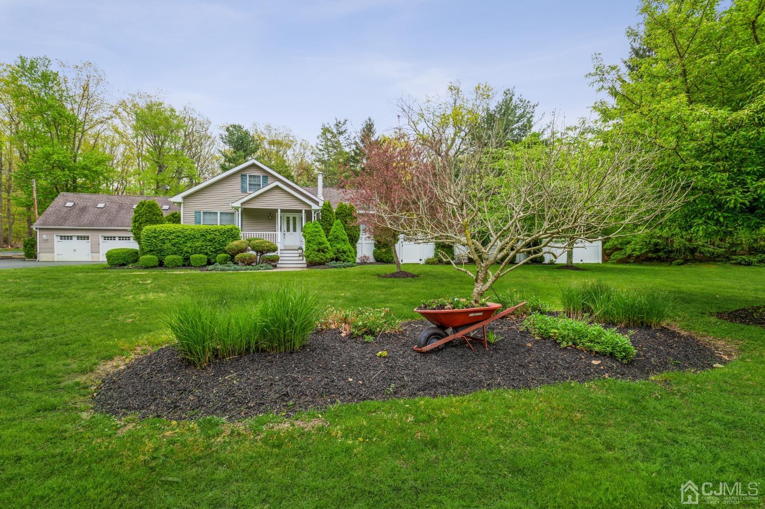 44 Chambers Road Cream Ridge, NJ 08514 - Photo 3 of 27 a front view of a house with garden