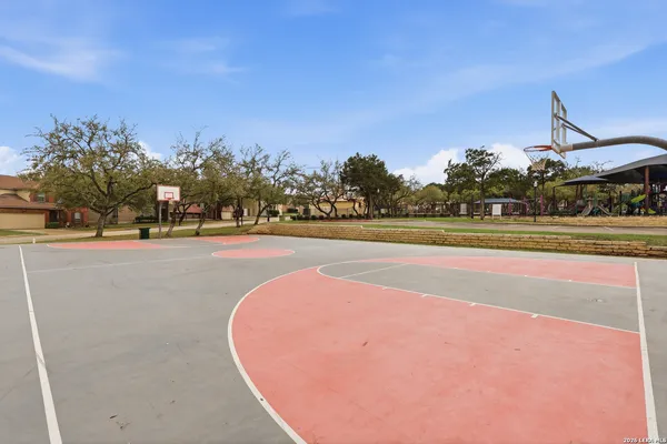 a view of swimming pool with a yard