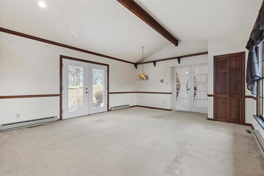 670 First Street Irwin, PA 15642 - Photo 23 of 49 The wood beam and mouldings add to the charm of the room!