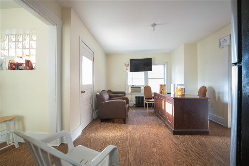 881 Lenz Avenue Ambridge, PA 15003 - Photo 12 of 30 a living room with furniture and a wooden floor