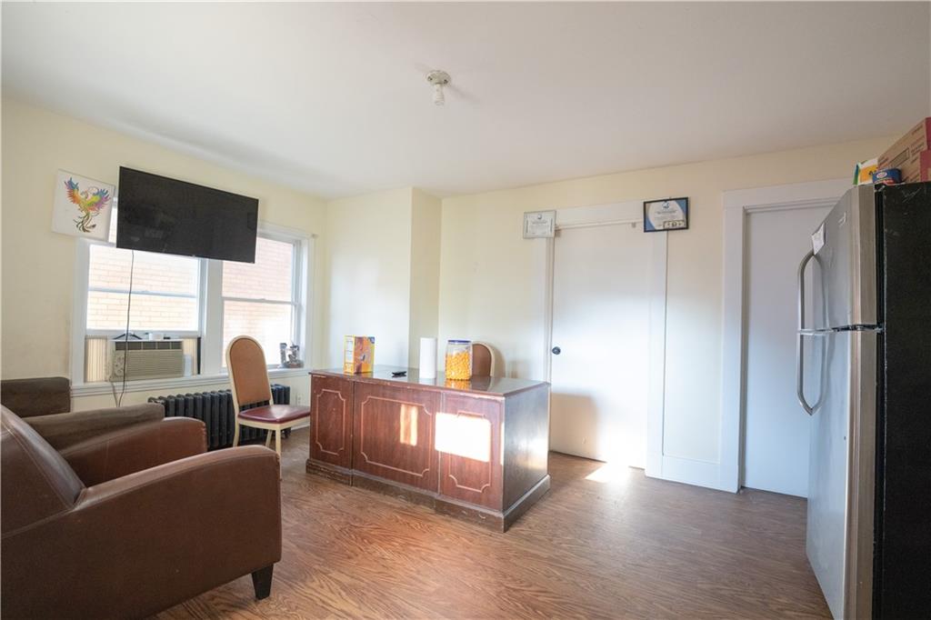 881 Lenz Avenue Ambridge, PA 15003 - Photo 13 of 30 a living room with furniture and a window