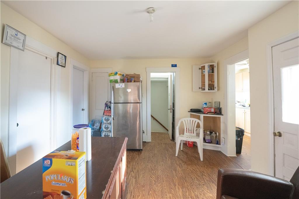 881 Lenz Avenue Ambridge, PA 15003 - Photo 14 of 30 a bedroom with furniture and a wooden floor