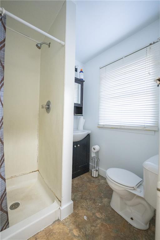 881 Lenz Avenue Ambridge, PA 15003 - Photo 16 of 30 a bathroom with a sink toilet and shower