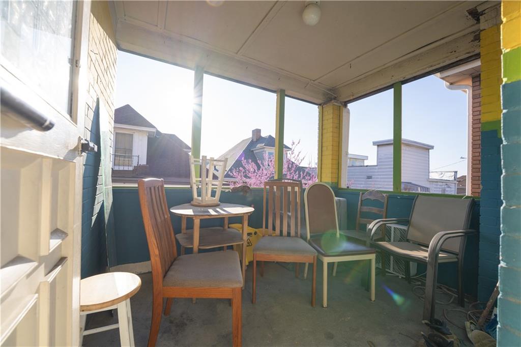 881 Lenz Avenue Ambridge, PA 15003 - Photo 17 of 30 a view of a dining room with furniture window and outside view