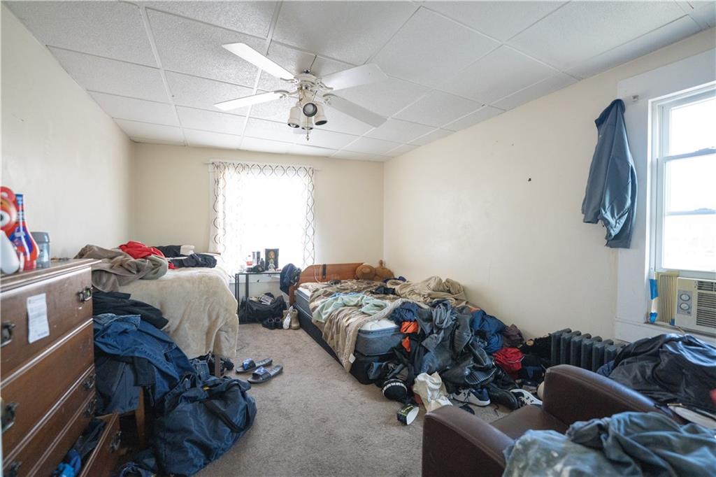 881 Lenz Avenue Ambridge, PA 15003 - Photo 18 of 30 a bedroom with furniture and a window