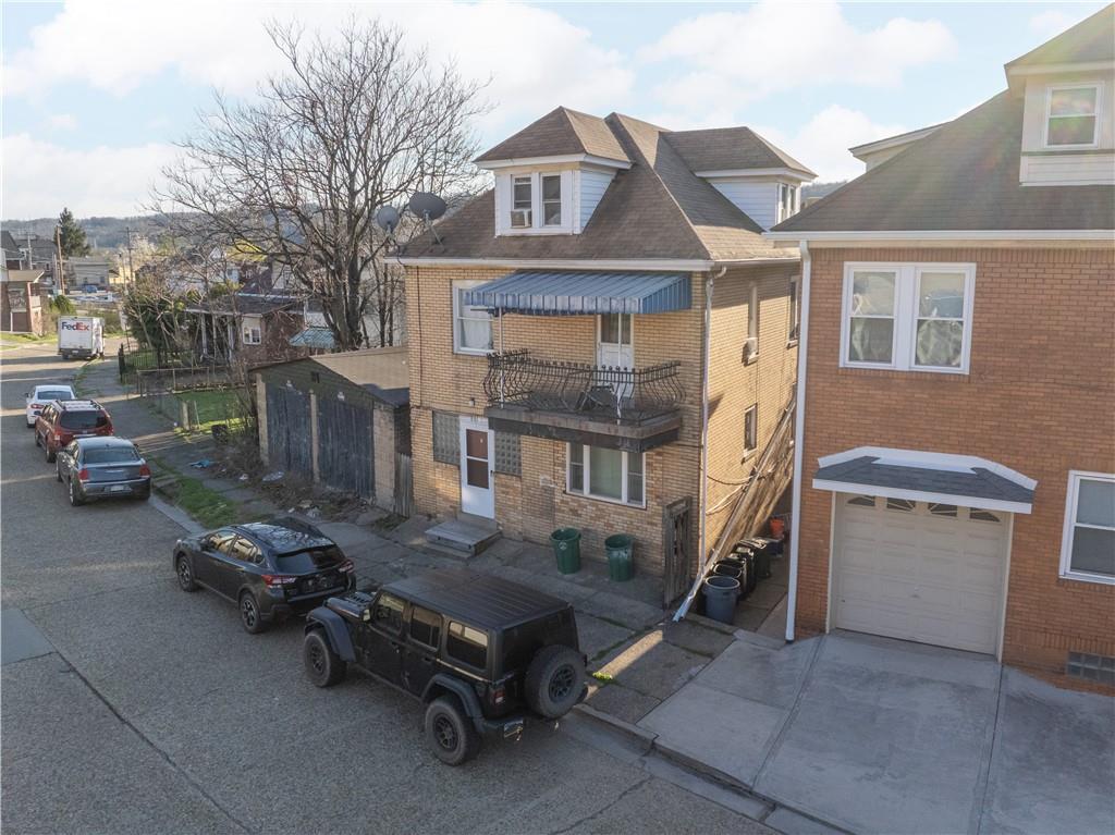 881 Lenz Avenue Ambridge, PA 15003 - Photo 2 of 30 a view of a car park in front of house