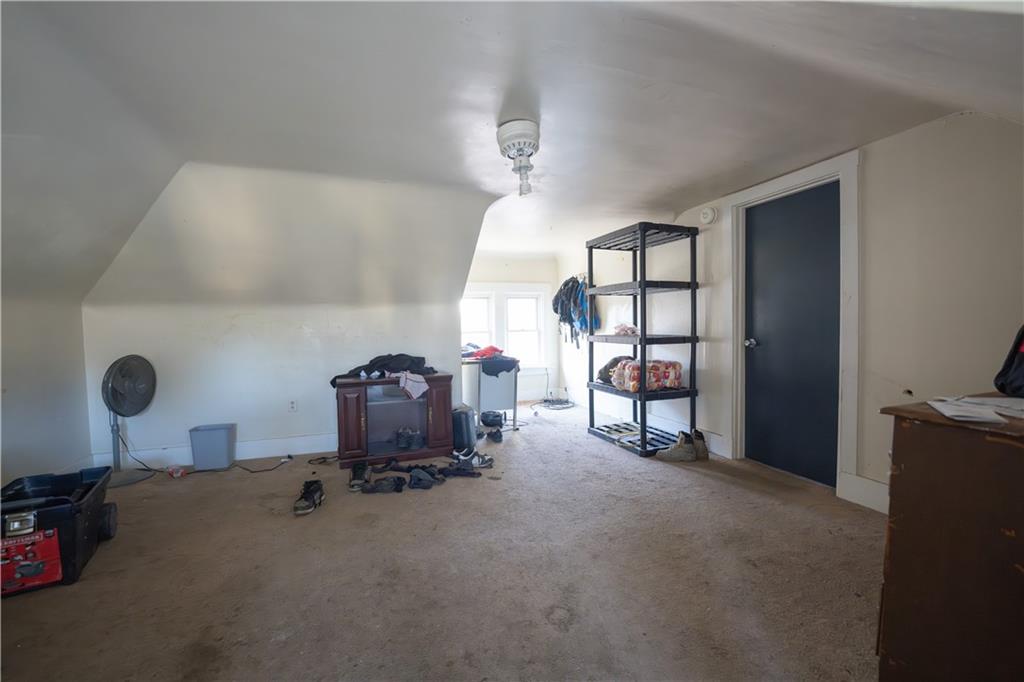 881 Lenz Avenue Ambridge, PA 15003 - Photo 21 of 30 a room with a chair and gym equipment