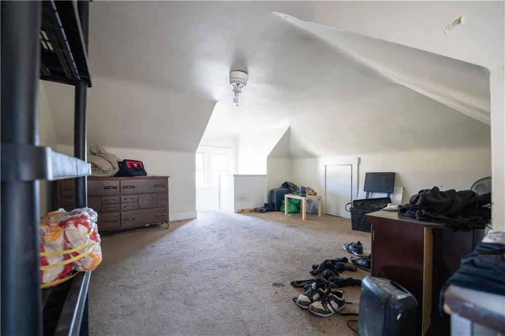 881 Lenz Avenue Ambridge, PA 15003 - Photo 22 of 30 a room with furniture a air conditioner vent and a window