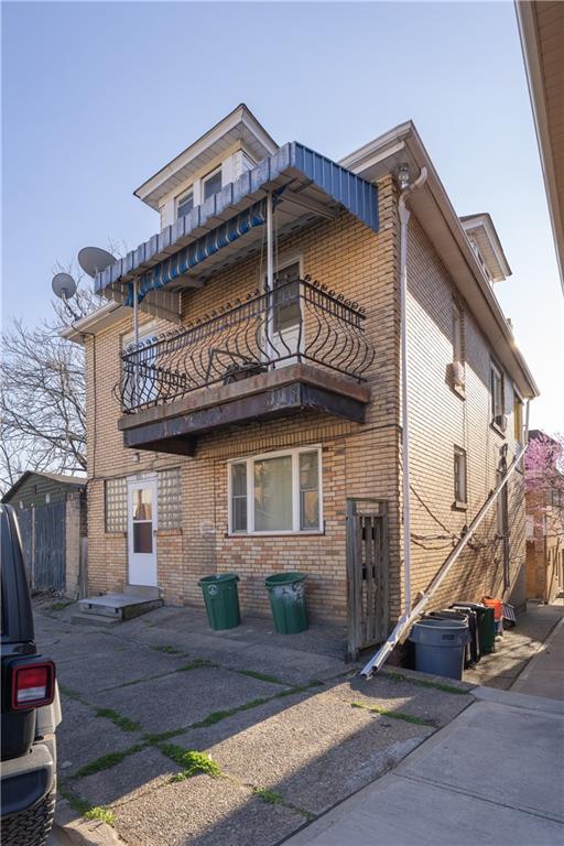881 Lenz Avenue Ambridge, PA 15003 - Photo 26 of 30 a view of a house with a patio