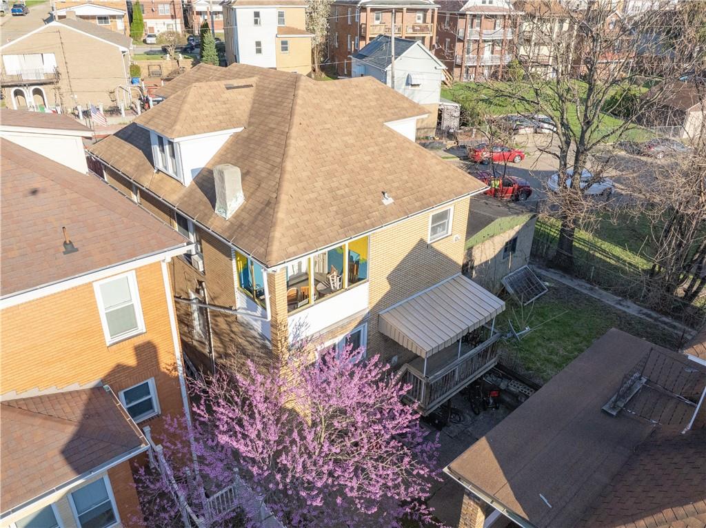 881 Lenz Avenue Ambridge, PA 15003 - Photo 28 of 30 an aerial view of a house with a yard and balcony