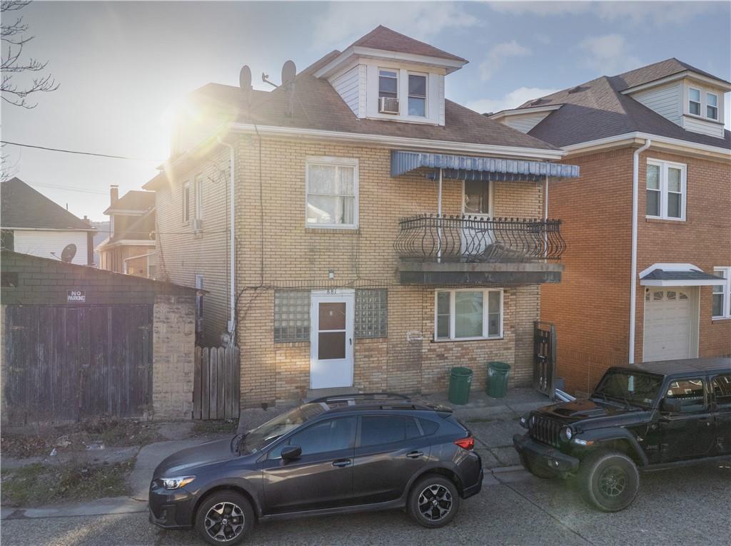 881 Lenz Avenue Ambridge, PA 15003 - Photo 3 of 30 a car parked in front of a house