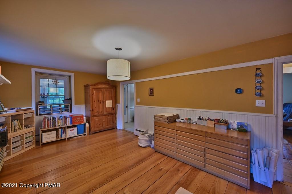 259 Hay Road Stroudsburg, PA 18360 - Photo 12 of 137 a view of a room with wooden floor and furniture