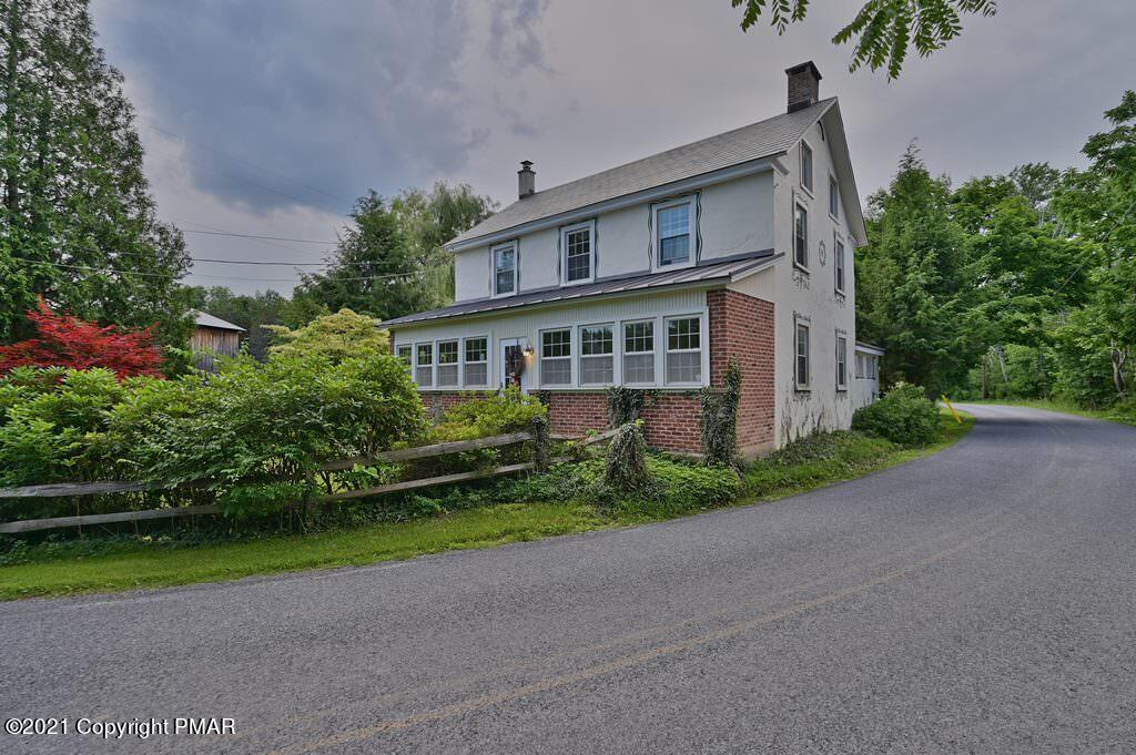 259 Hay Road Stroudsburg, PA 18360 - Photo 3 of 137 a view of a house with a yard and potted plants