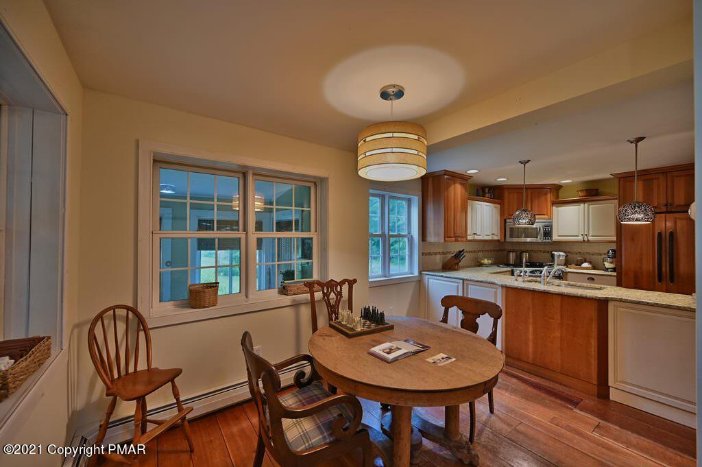 259 Hay Road Stroudsburg, PA 18360 - Photo 38 of 137 a view of a dining room with furniture window and wooden floor