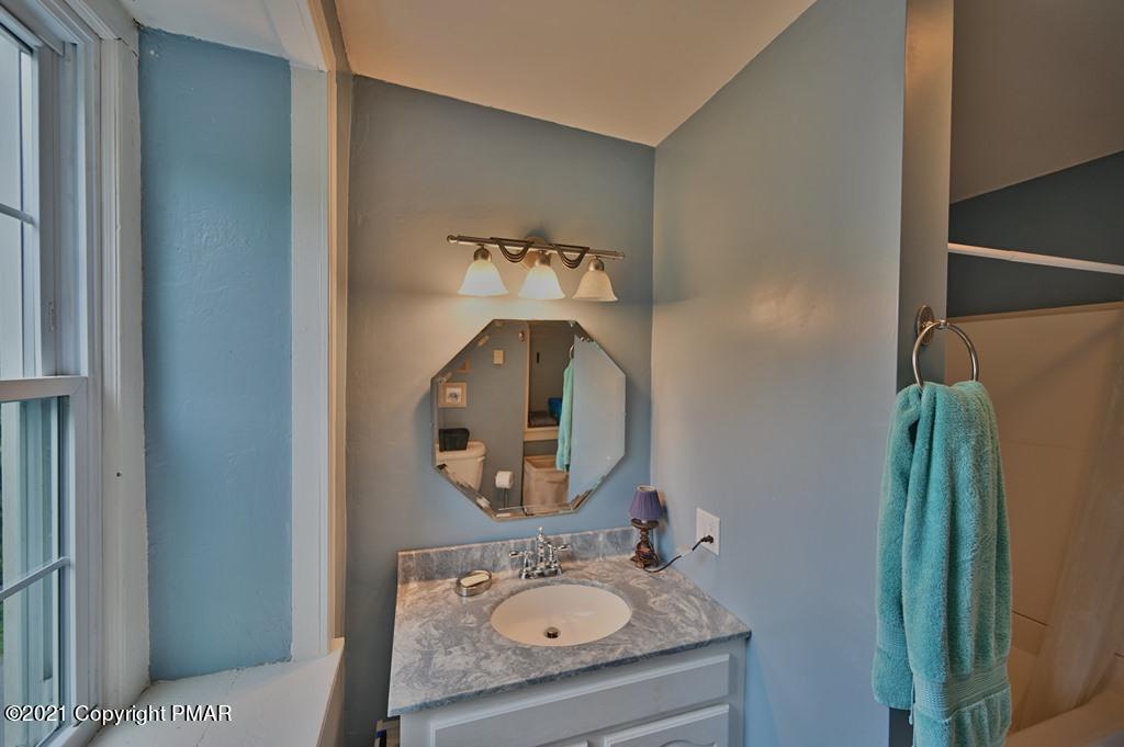 259 Hay Road Stroudsburg, PA 18360 - Photo 45 of 137 a bathroom with a sink double vanity and a mirror