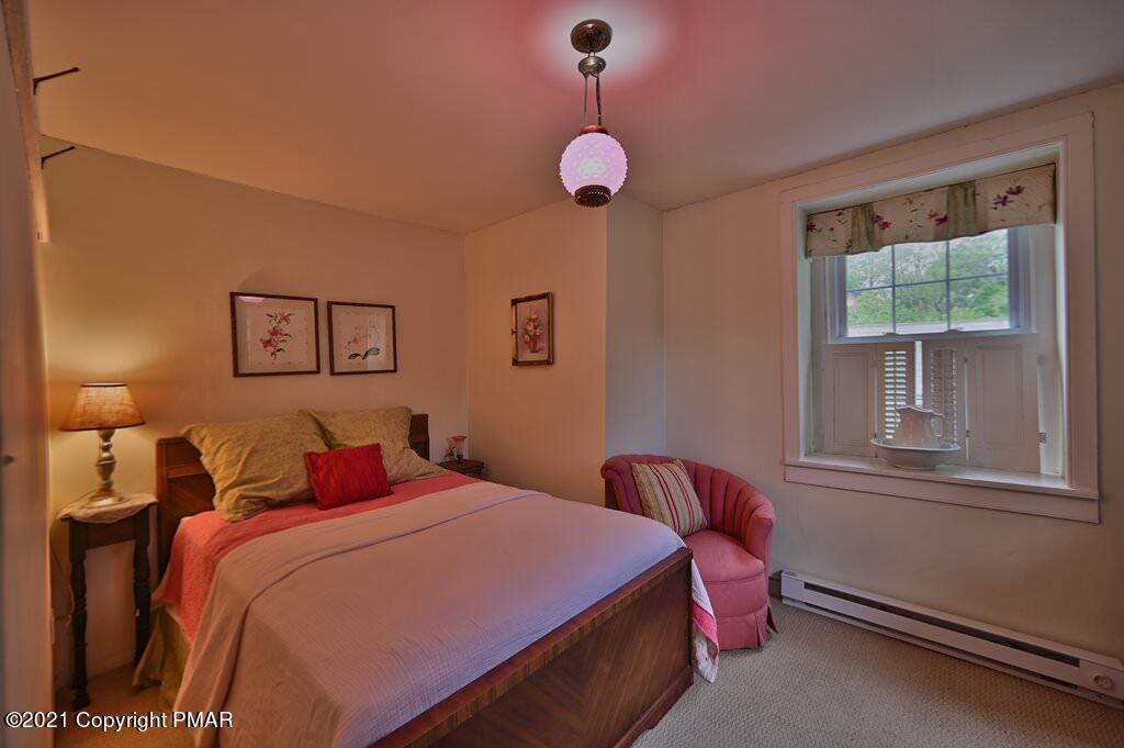 259 Hay Road Stroudsburg, PA 18360 - Photo 48 of 137 a bedroom with a bed and a window