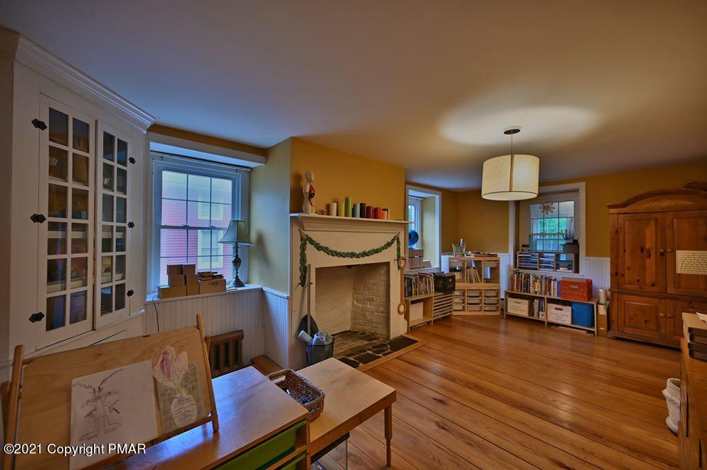 259 Hay Road Stroudsburg, PA 18360 - Photo 10 of 137 a living room with furniture and a fireplace