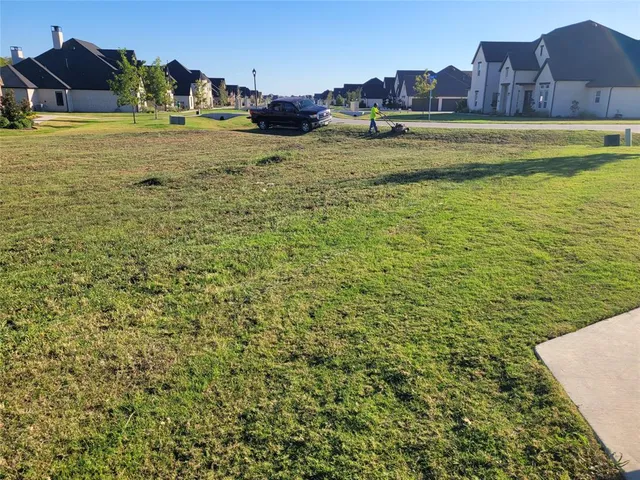 a view of a city with lawn chairs