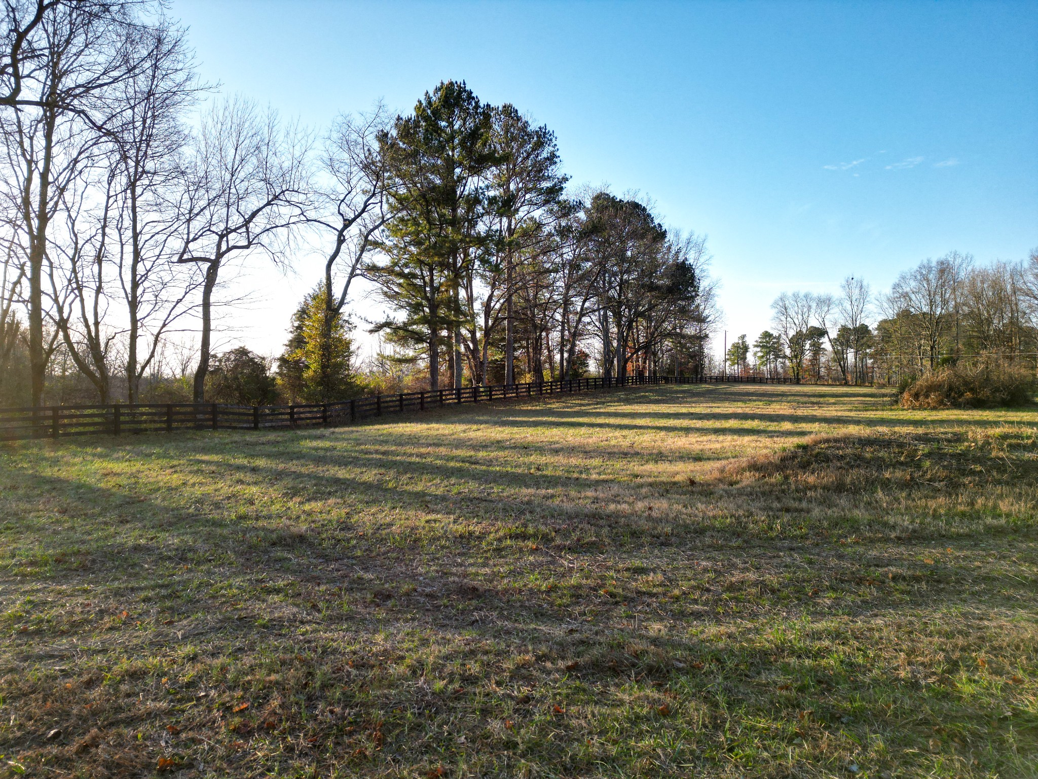 10001 Davis Branch Road Bon Aqua, TN 37025 - Photo 3 of 38 a view of a golf course with a lake